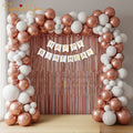 Rose gold and white birthday decoration set with foil curtains, metallic balloons and happy birthday banner