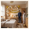 Luxury golden anniversary bedroom decoration with gold Happy Anniversary foil balloons, red heart foil balloons, premium balloon arch and fairy lights.