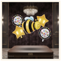 Bee Happy 5 Pcs foil balloon decoration set with one bee foil balloon, two gold star foil balloons, and two Happy Birthday printed round foil balloons.