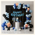 Boss Baby birthday decoration with blue Happy Birthday foil balloons, blue black silver balloon arch, Boss Baby character balloons and premium first birthday backdrop.